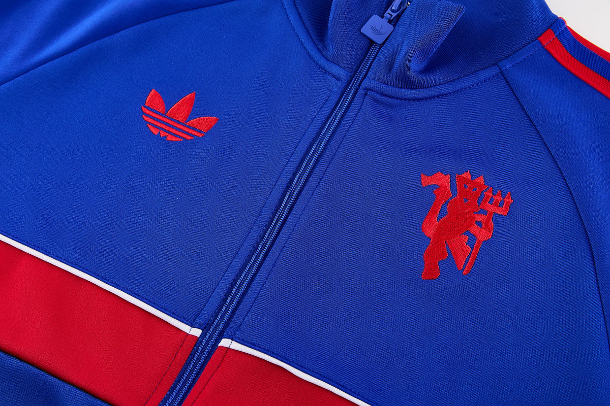 Tuta Manchester United zip 26-27 blu striscia rossa