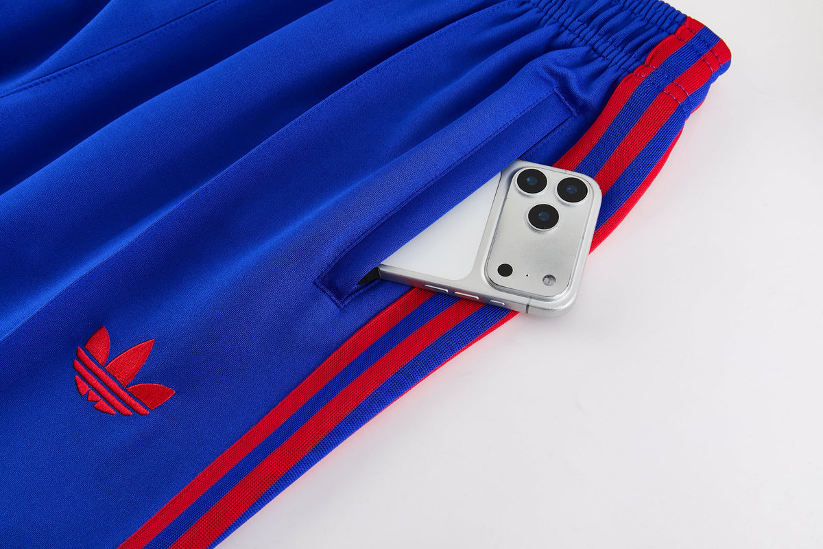 Tuta Manchester United zip 26-27 blu striscia rossa